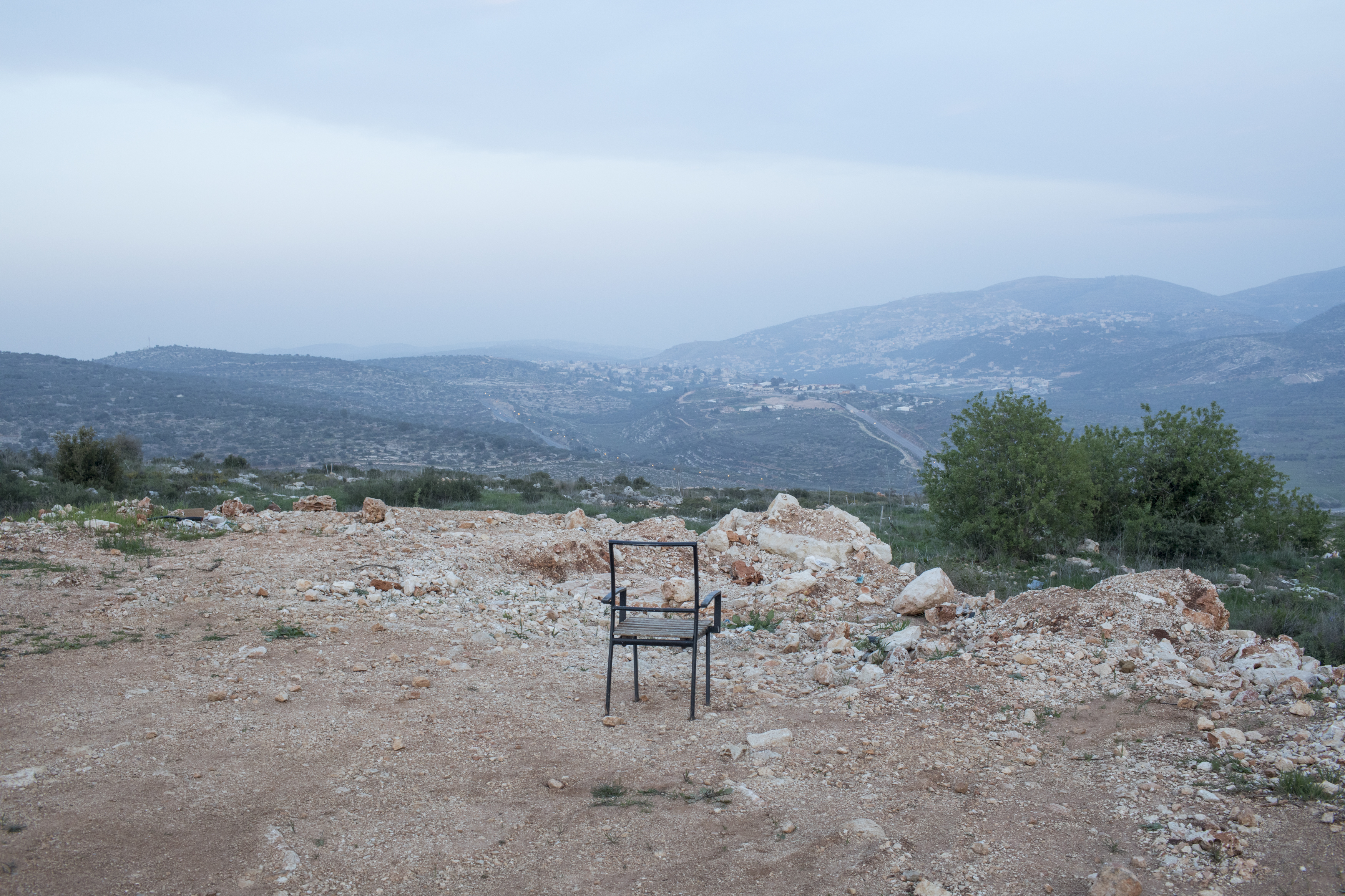 002_Israeli-settlements_MAP_7597 Israeli outpost of Nofei Nehemia, West Bank, 2017. A chair used by the soldiers guarding the settlement.
