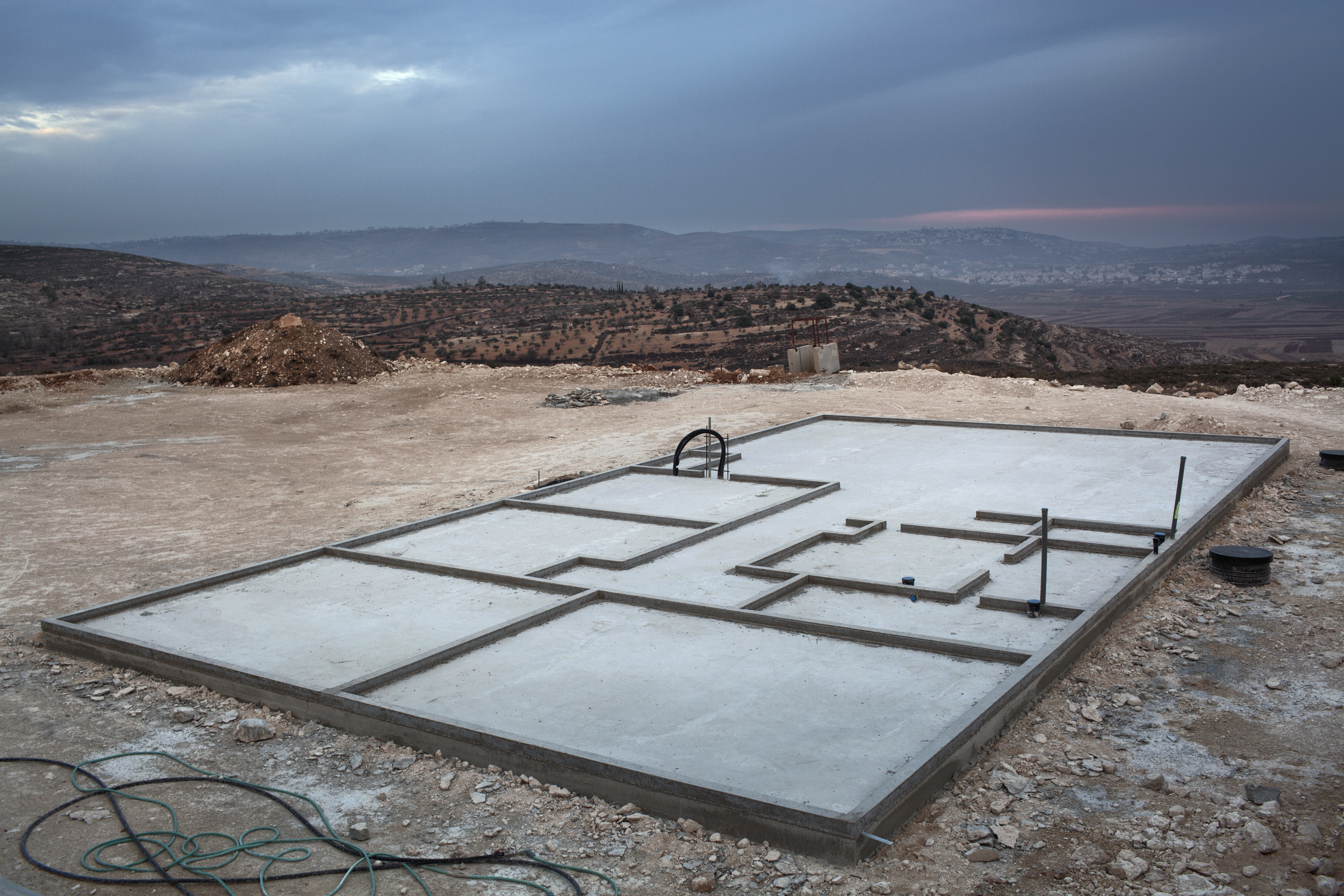 021_Israeli-settlements_MAP_7584 Outpost of Adei Ad, West Bank, 2013. The basis of a new Israeli house. Constructions never really stopped neither in the settlements nor in the illegal outposts, despite the requests of the international community and the Palestinians.