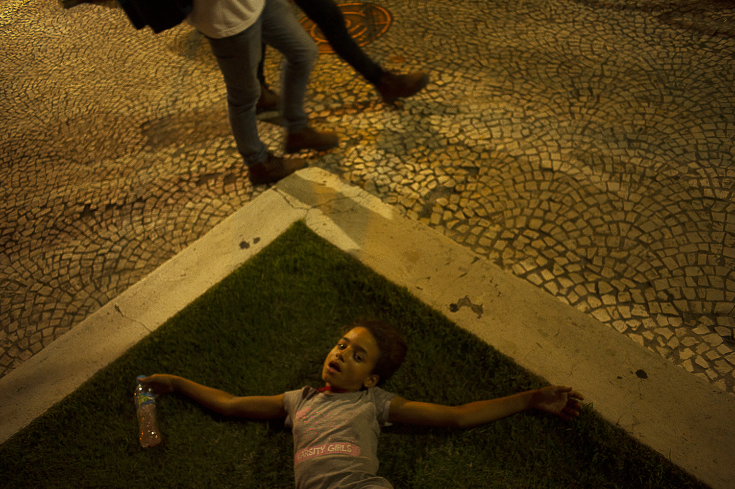 A 10 years old girl having hallucinations after sniffing ether is seen around Berrini Avenue in São Paulo Brazil. The neighbourhood around the Berrini avenue is hosts the offices of some of the most important companies of the world as Google, Facebook and many Brazilian companies. The region has been called as the modern financial heart of São Paulo.