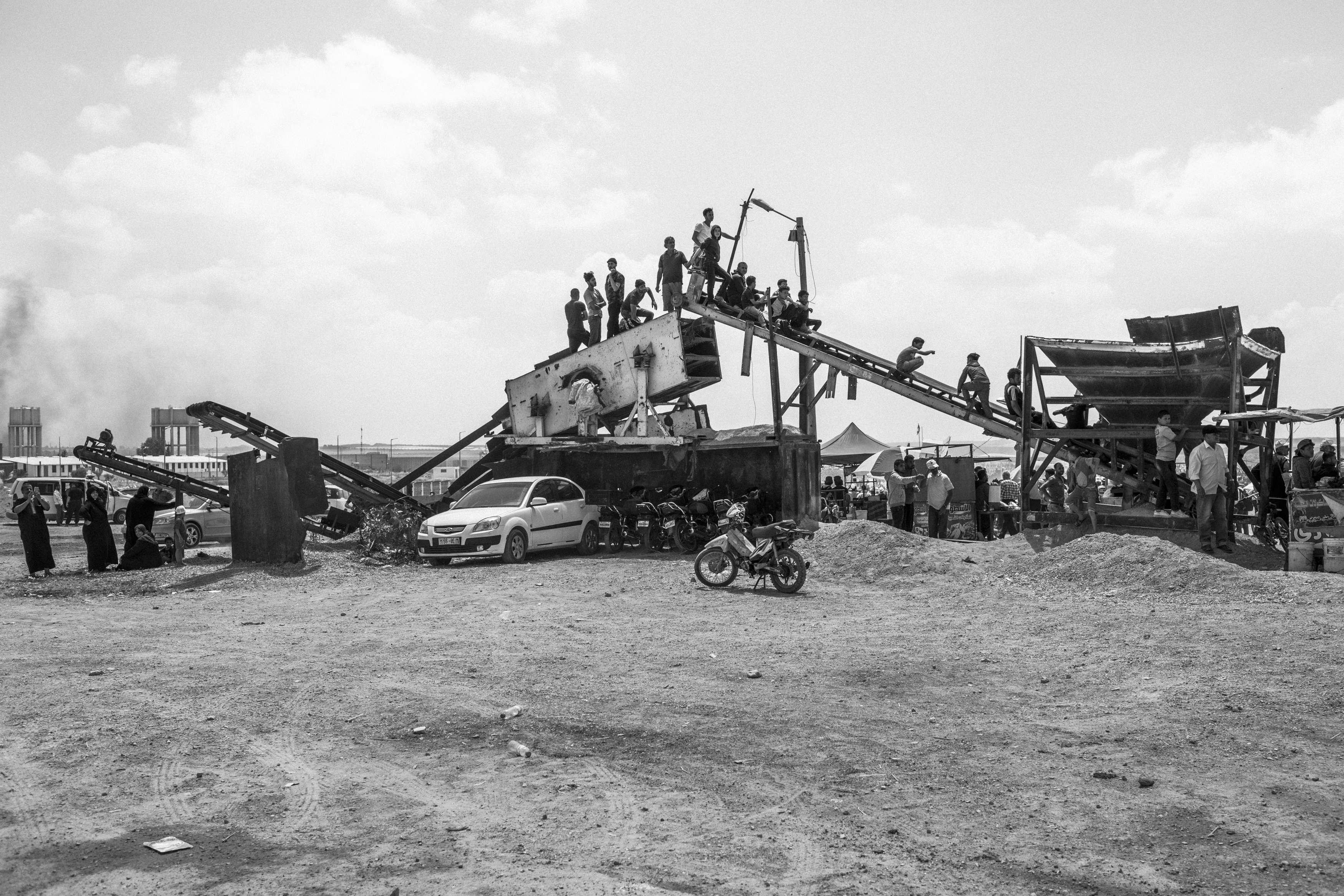 Gaza Strip, May 14, 2018. Palestinians look at the protest taking place along the Israeli-Gaza border.  On the  same day, in Jerusalem, is taking place the controversial opening of the American Embassy.