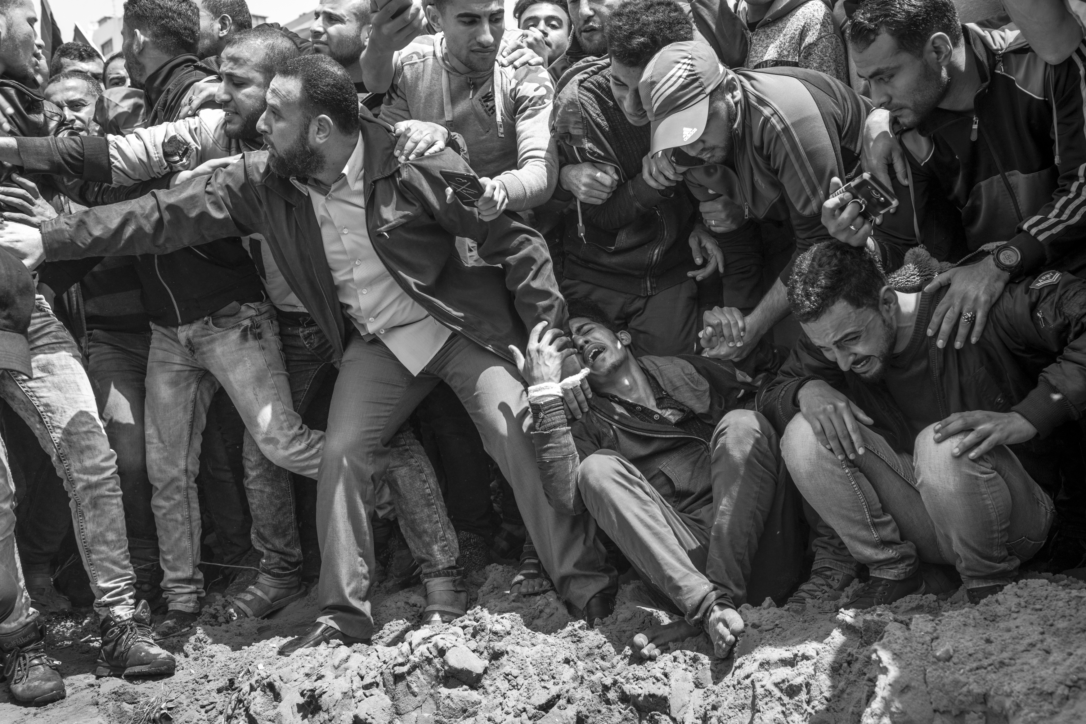 Gaza Strip, April 26, 2018. The funeral of Ahmed Abu Hussein (24), a Palestinian journalist who died of his wounds after being shot by an Israeli sniper while covering the “Great March of Return”.