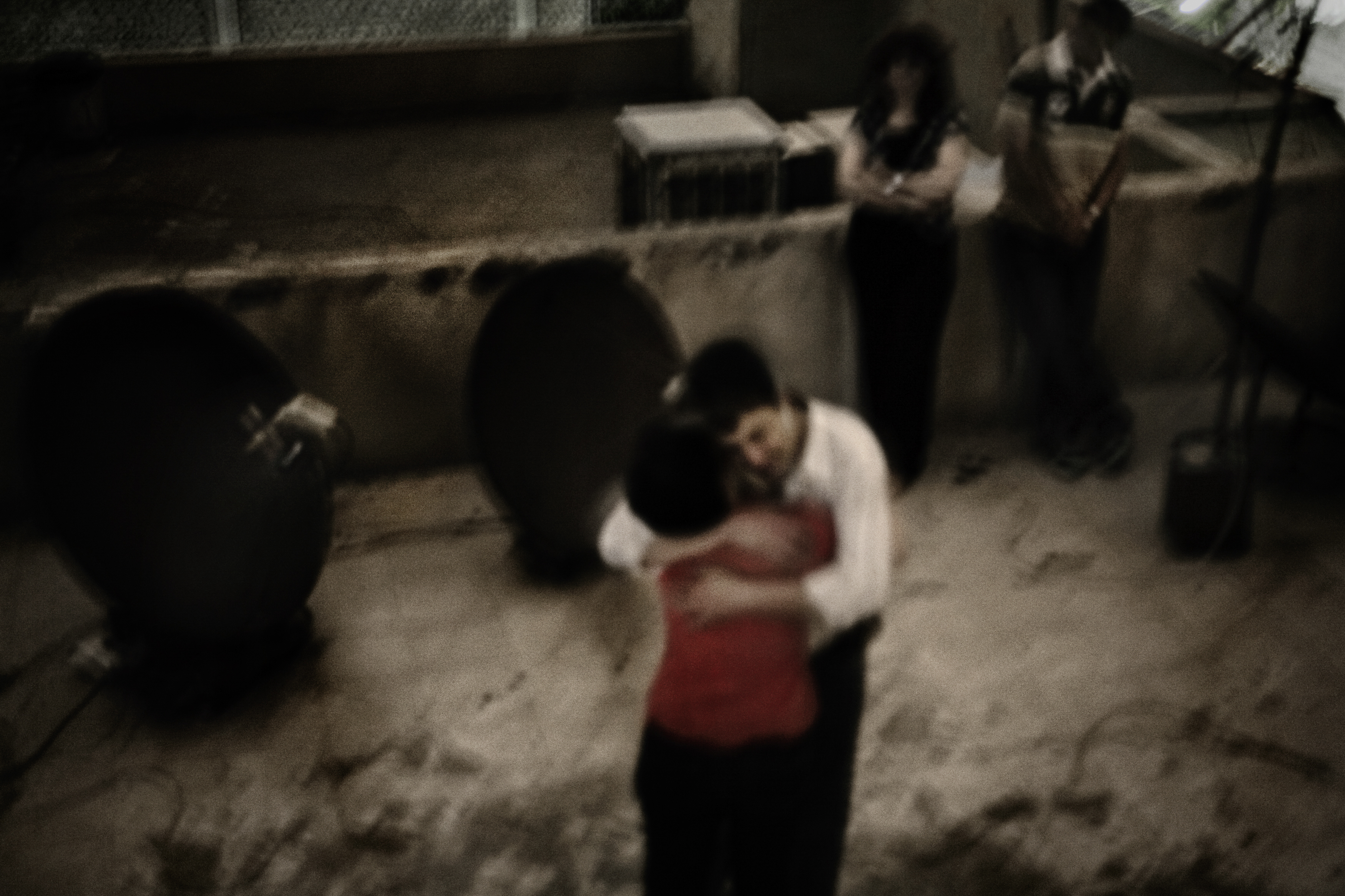 25 June, 2009
A brother and sister embrace during the rooftop protests after the disputed presidential elections in Iran. The result had been a victory for President Mahmoud Ahmadinejad over opposition candidate Mir Hossein Mousavi, but there were allegations of vote-rigging. In the ensuing weeks, violent demonstrations took place in the streets. At night, supporters of Mousavi climbed their rooftops, shouting expressions of their discontent. As the streets emptied and went quiet after daytime demonstrations, cries of 'Allahu akbar!' and 'Death to the dictator!' filled the night air. These protests were an echo of the ones that took place during the 1979 Islamic Revolution.