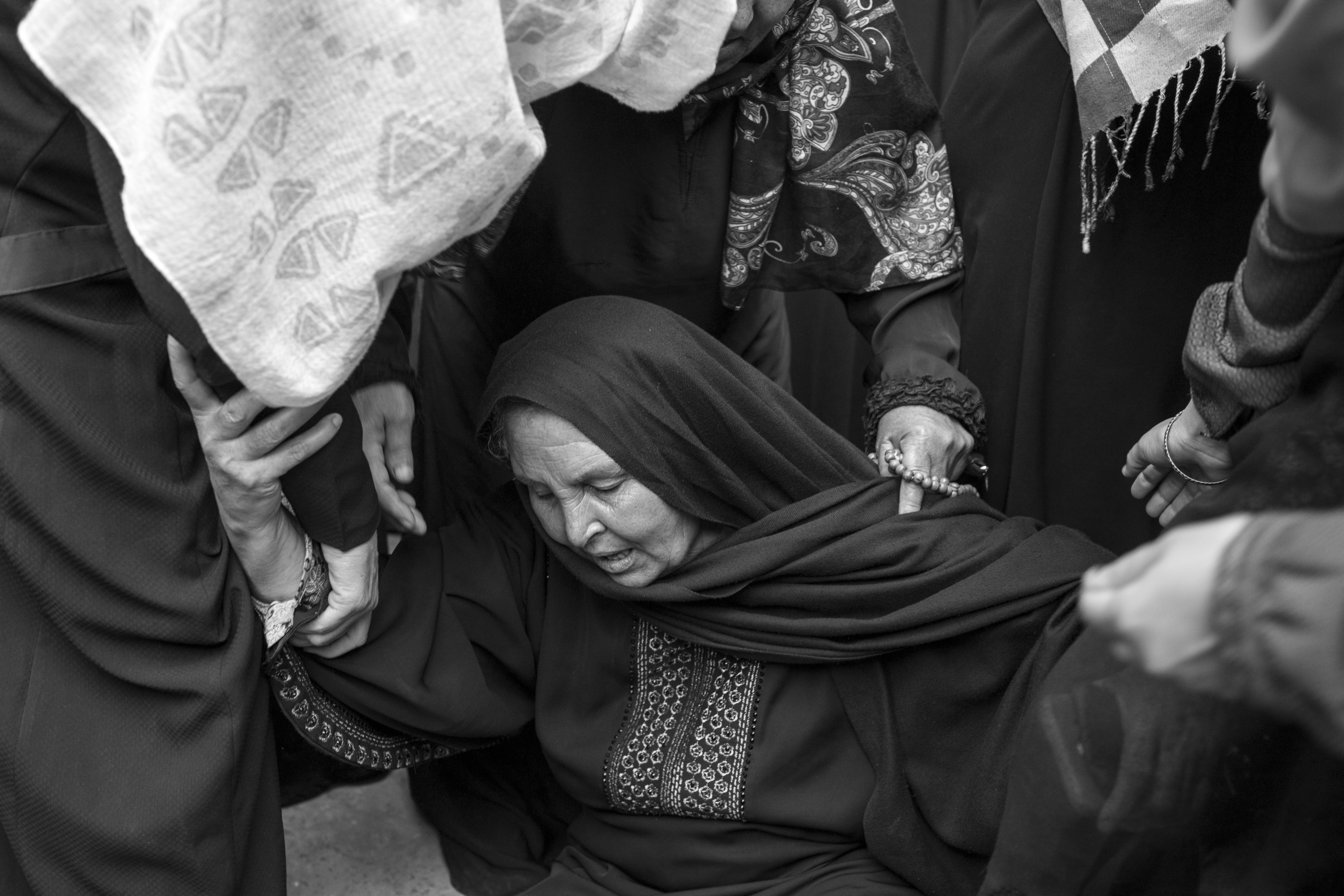Gaza Strip, May 6, 2018. Palestinian women mourn the body of Bahaa Qudeih (23) during his funeral in Khan Younis (southern Gaza Strip), after he was killed by Israeli forces while attempting to cross the Israeli-Gaza border.