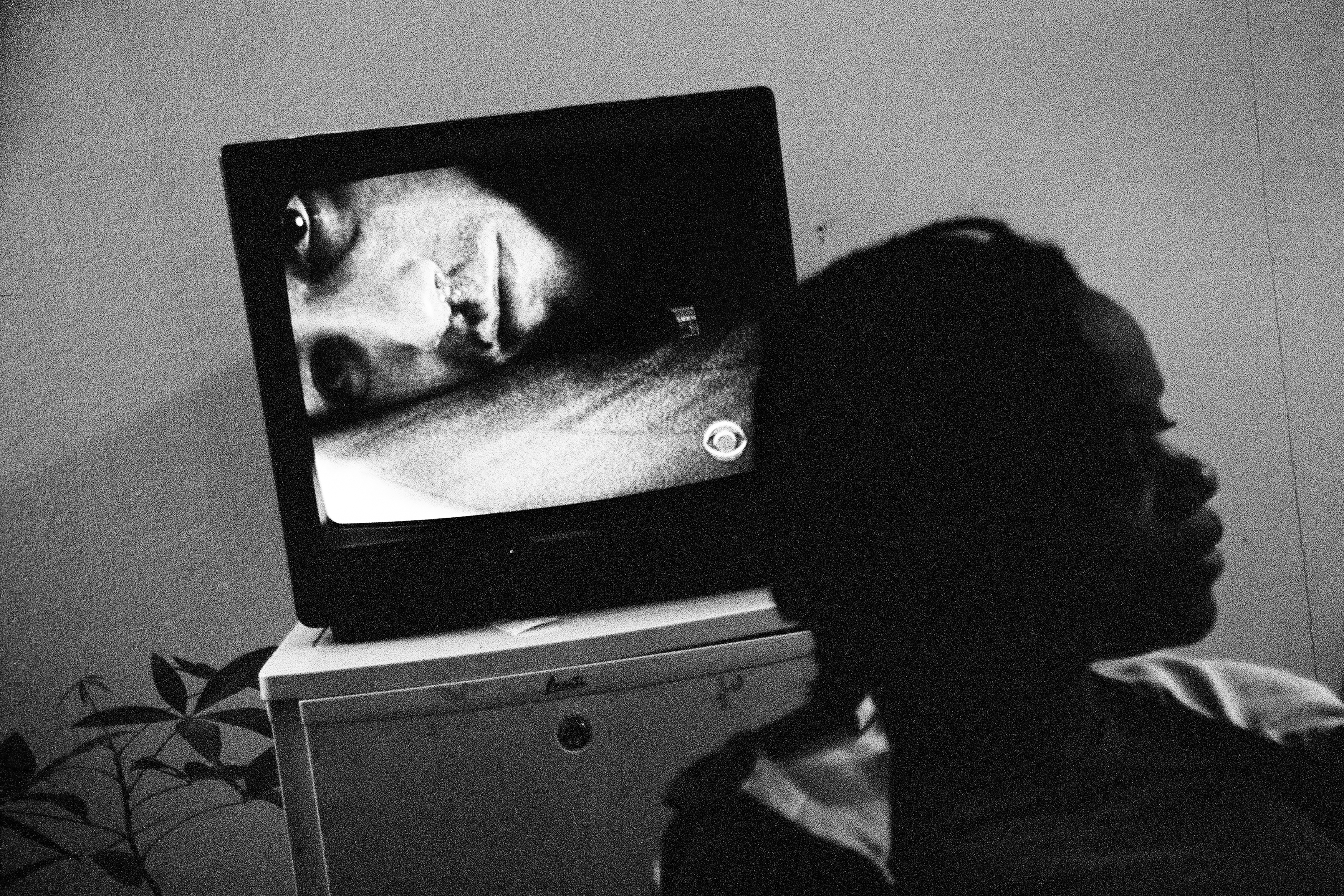 Alexandra Hobbes, blind since the age of four because of domestic violence, listens to the television in the apartment where she lives with her husband Elijah Hobbes, albino and visually impaired. The blind listen to television and hope for a device that more fully describes scenes so they can enjoy the programs on the same level as the hearing impaired. New York, NY. April 16, 2012