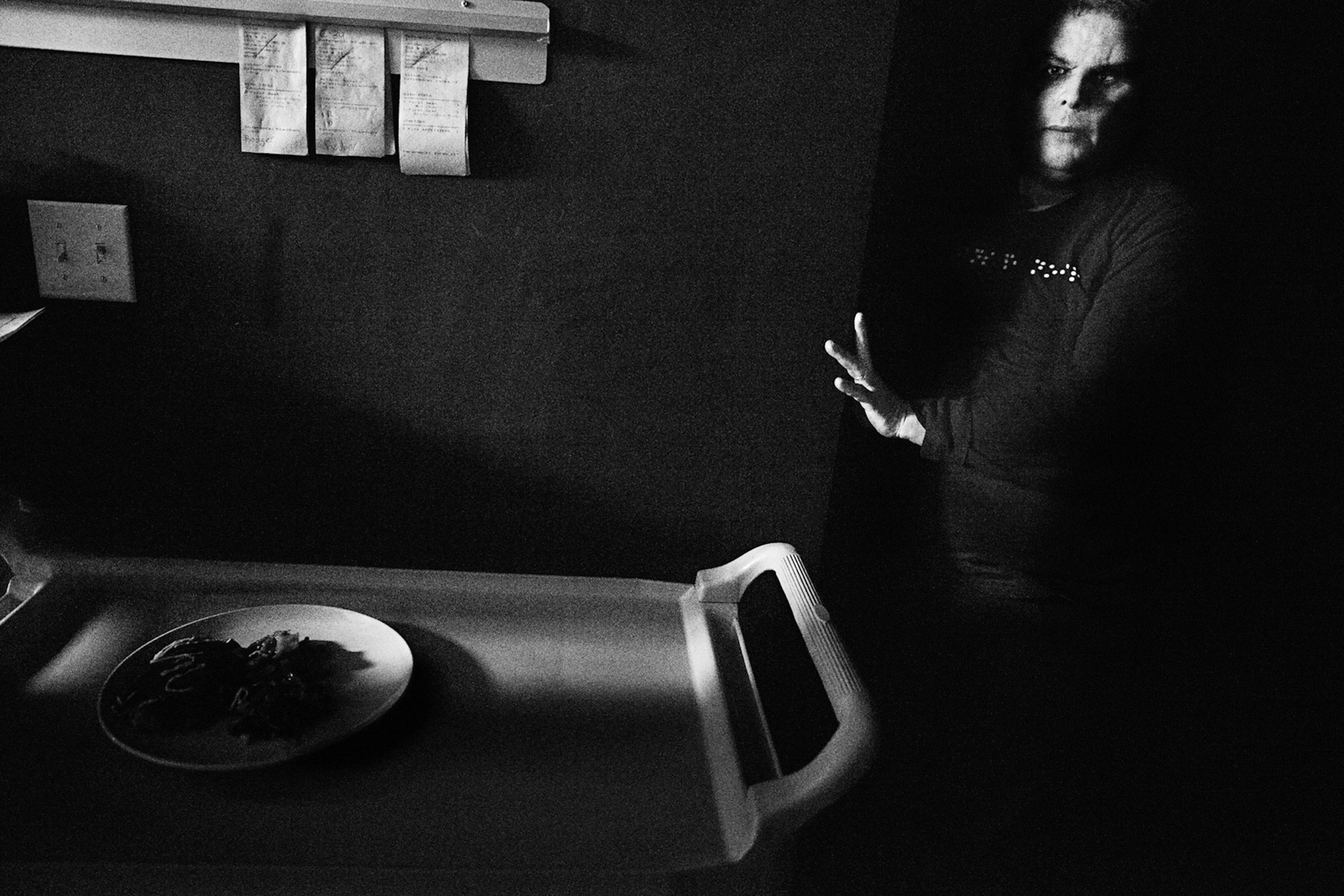 Kitchen of the restaurant Dans le Noir, where blind waiters serve in the pitch black dining room. They're the only ones able to find orientation in the dark, guide and serve clients. The aim of the restaurant is to let people experience the sensation of eating without seeing the food, or anything else around them. New York. Mar 11, 2012
