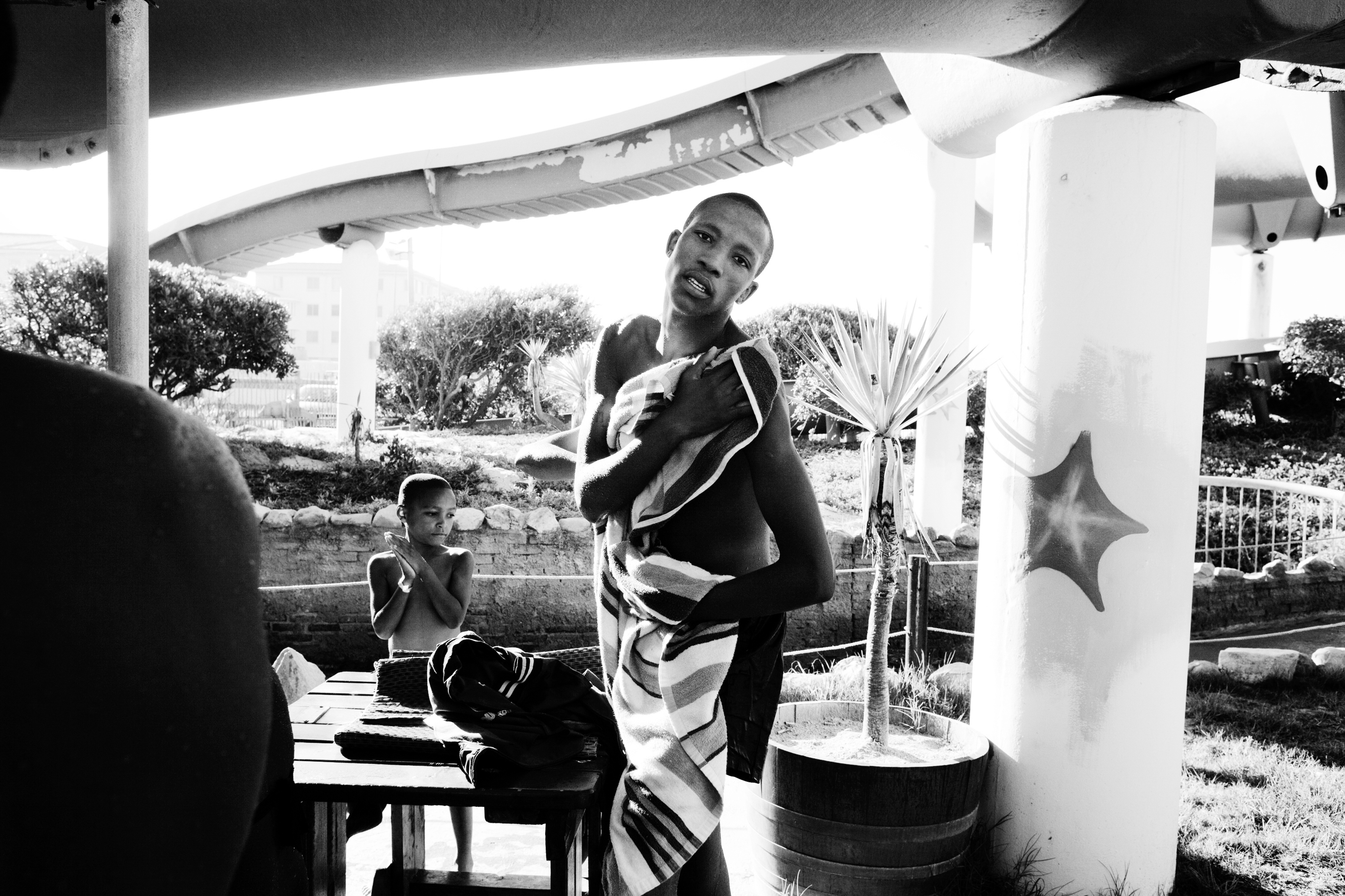 Nkosinathi Dodi, 18, from Khayelitsha, at the Muizenberg water park during a field trip with the Beth Uriel home for disadvantaged young men, in Cape Town. His stay at the home was brief. “He lives in an old abandoned building now, but I see him at church,” says the program director Lindsay Henley. “From the looks of it, he struggles with drugs.” “As much as we tried to help him and as much as he needed help, he’s got no other family, he still got sucked in by the pressures of drugs and gangsterism,” says Melvin Koopman, another a director at Beth Uriel.