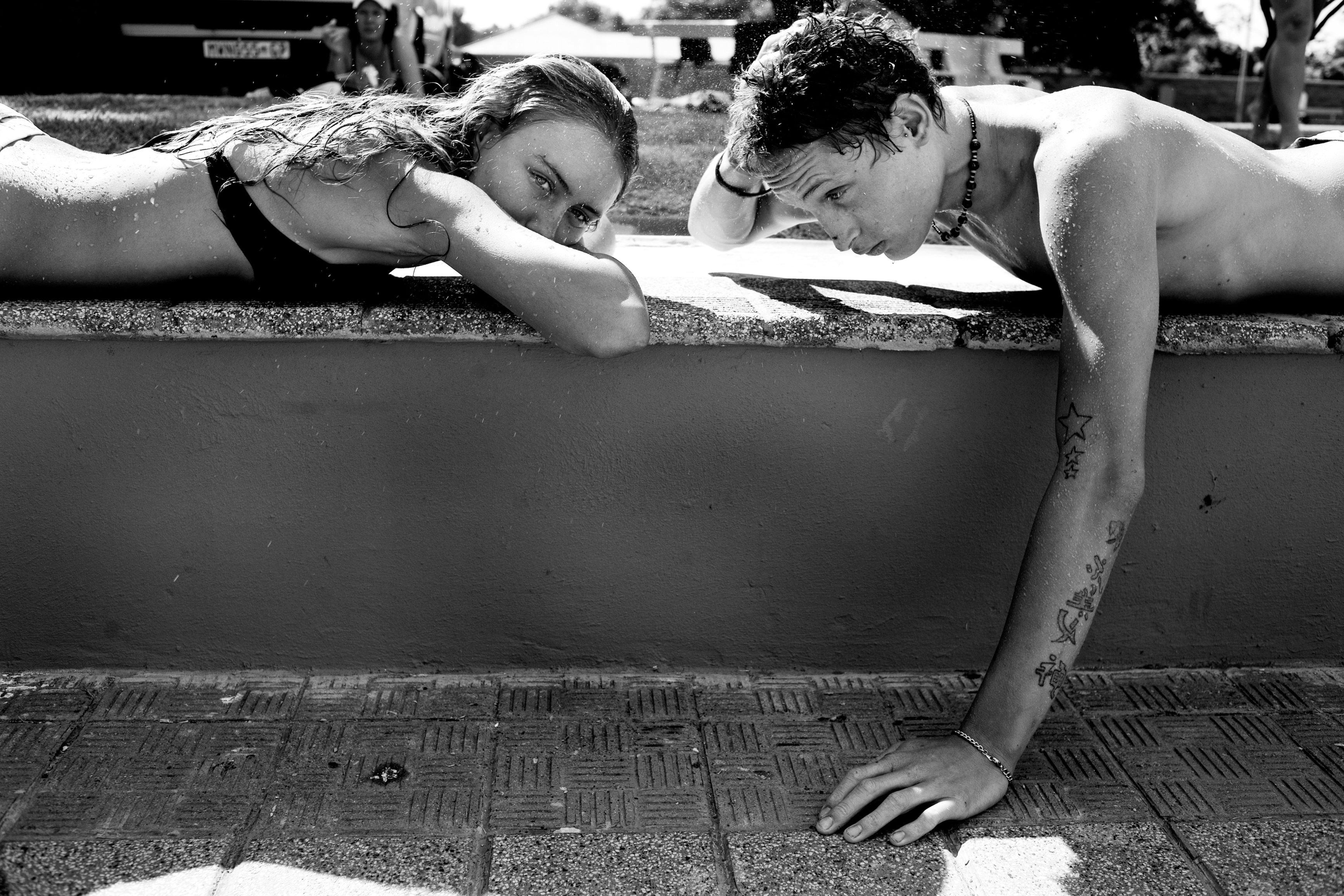 A young couple at the neighborhood pool in Brixton, a suburb of Johannesburg, South Africa in 2008.