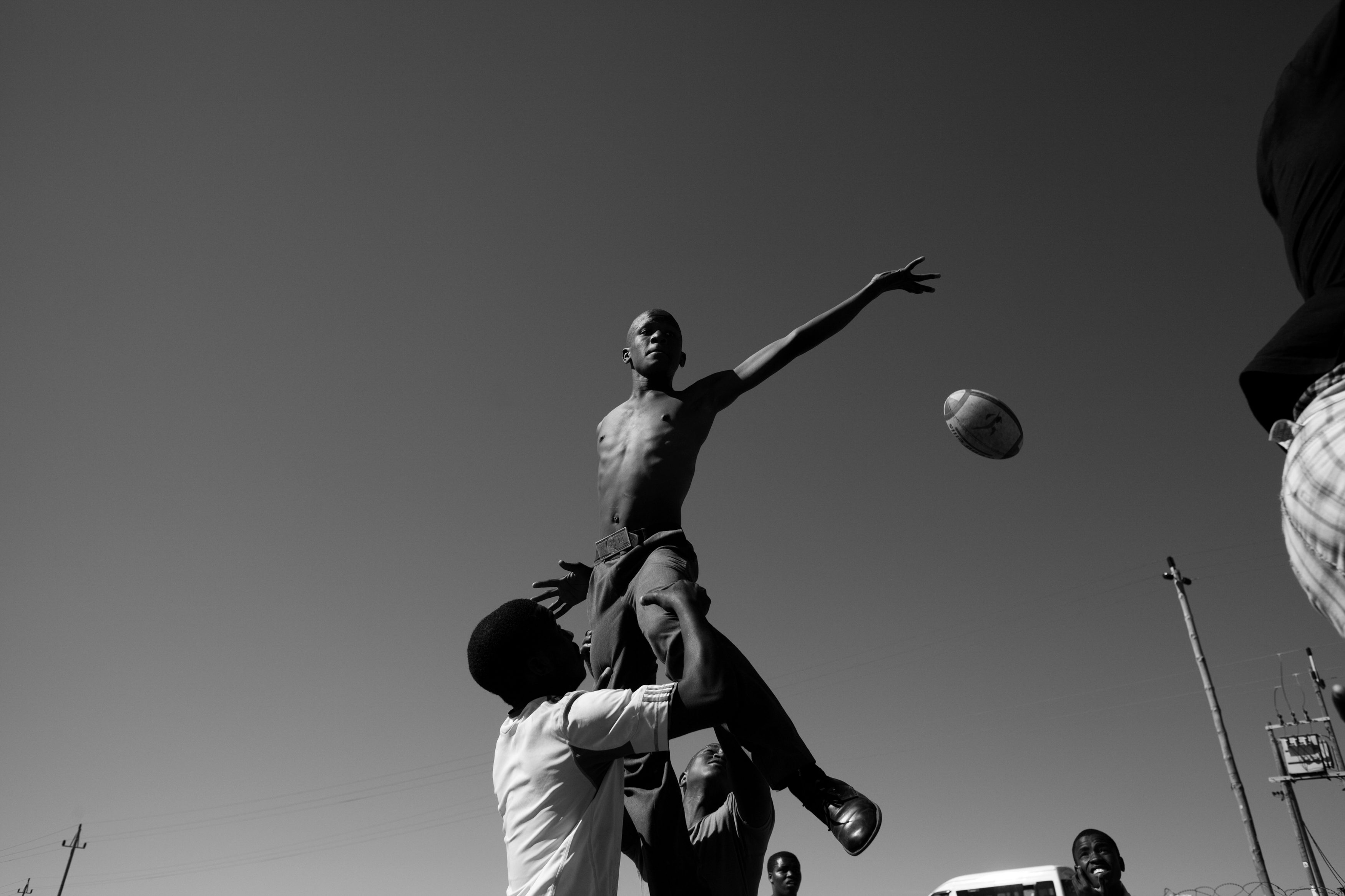 Ndumiso Gaga, 19, practices rugby with classmates at Iqhayiya Senior Secondary School, in Khayelitsha, Cape Town. “It’s hard to grow up here, because there are many things that are bad,” says Gaga. “If you don’t have some talent, you become a thief, a crook... I was staying in a very poor family, but every time I try to change my life it gets better… now my family is getting encouraged that I’m playing rugby. I’m going to build a house for my family if I become a star. It’s hard, because many people want this opportunity. I have to train hard to be a star.”