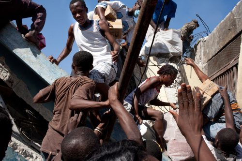 A massive earthquake hit Haiti on 12nd of January 2010 leaving about 210,000 dead people.
18th Jan 2010, haiti, Port-au-Prince. People plundering among the ruins.