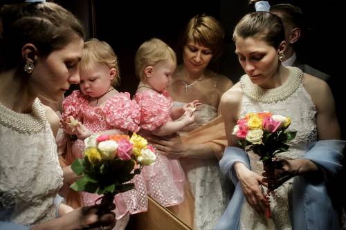 Polina Popova in her wedding dress with her soon-to-be wife Irina Sinoveva and their little girl Ksenia. Same-sex marriages are not possible, nor legally acknowledge in Russia, so the lesbian couple have travelled from their hometown St. Petersburg to Copenhagen, Denmark where it's been legal since 2012. As of 1 January 2015, only seventeen countries in the world allows same-sex marriages.