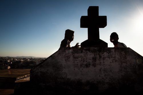 Smoking weed during at sunset. Anjanahary cemetery, Antananarivo, Madagascar.